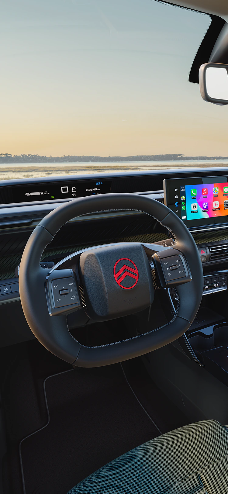 Bestuurdersaanzicht van de Citroën C3 compacte SUV met digitaal instrumentenpaneel en groot touchscreen voor intuïtief, modern en betaalbaar dagelijks rijden.